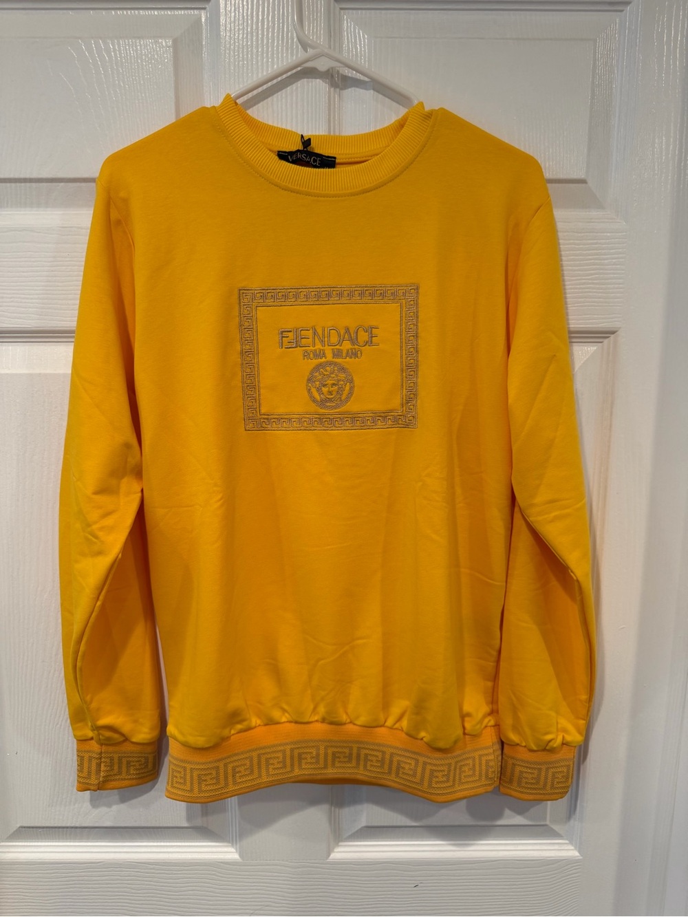 Versace Men’s Gold Crewneck Sweater with Embroidered Medallion
